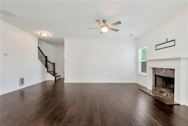 4171 Towncastle Ln, Buford, GA 30518 - unfurnished living room with ceiling fan, crown molding, stairway, a fireplace, and dark wood finished floors