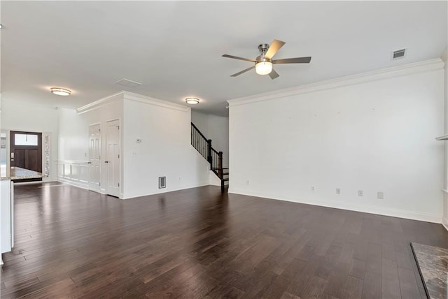 4171 Towncastle Ln, Buford, GA 30518 - unfurnished living room featuring a ceiling fan, dark wood-type flooring, stairway, and ornamental molding