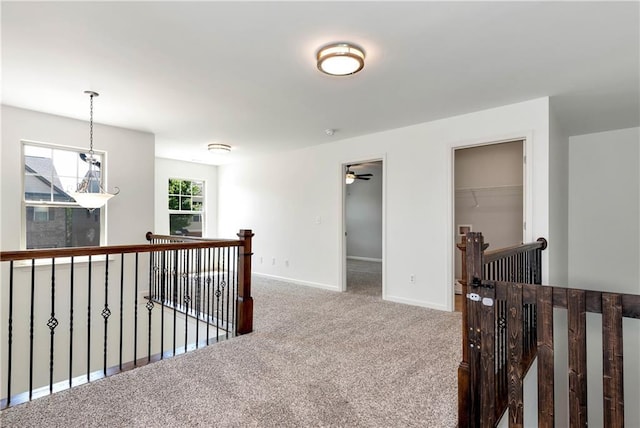 4171 Towncastle Ln, Buford, GA 30518 - hallway with an upstairs landing, carpet, and baseboards
