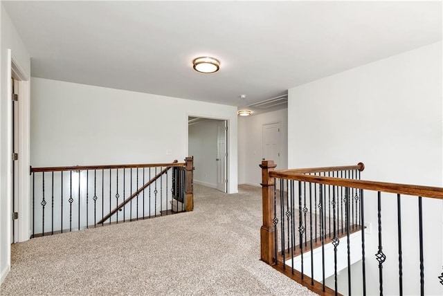 4171 Towncastle Ln, Buford, GA 30518 - corridor featuring an upstairs landing, carpet floors, and baseboards