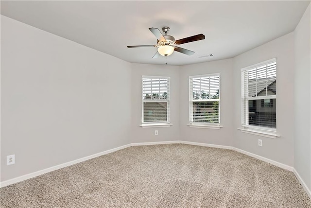 4171 Towncastle Ln, Buford, GA 30518 - spare room with a ceiling fan, carpet, and baseboards