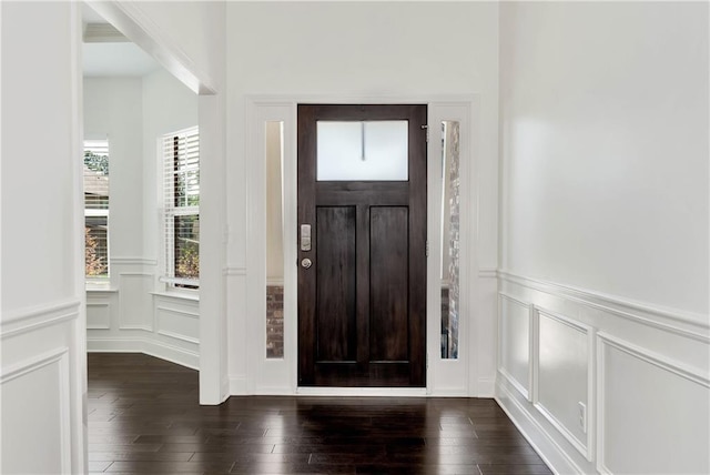 4171 Towncastle Ln, Buford, GA 30518 - entryway with a decorative wall, wainscoting, and dark wood finished floors