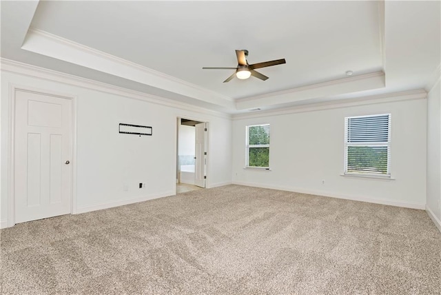 4171 Towncastle Ln, Buford, GA 30518 - unfurnished room with a tray ceiling, ornamental molding, ceiling fan, light colored carpet, and baseboards