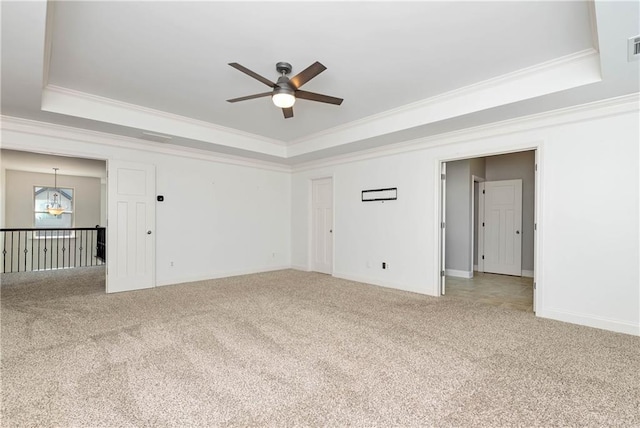 4171 Towncastle Ln, Buford, GA 30518 - carpeted empty room with a raised ceiling, ceiling fan, ornamental molding, a chandelier, and baseboards