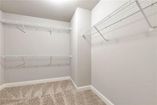 4171 Towncastle Ln, Buford, GA 30518 - spacious closet featuring carpet flooring