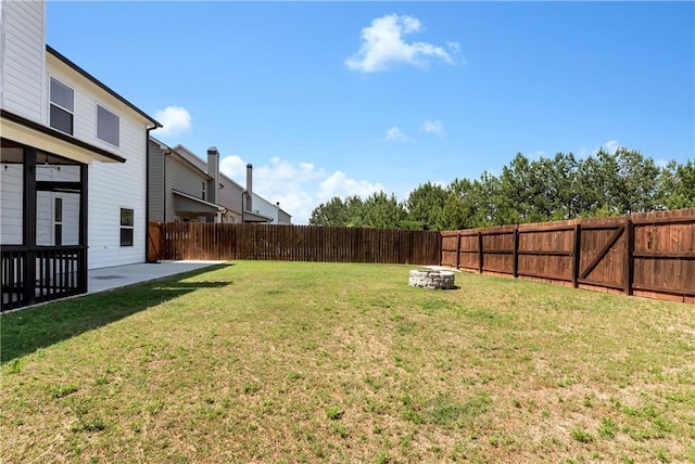 4171 Towncastle Ln, Buford, GA 30518 - view of yard featuring a fire pit and a patio area