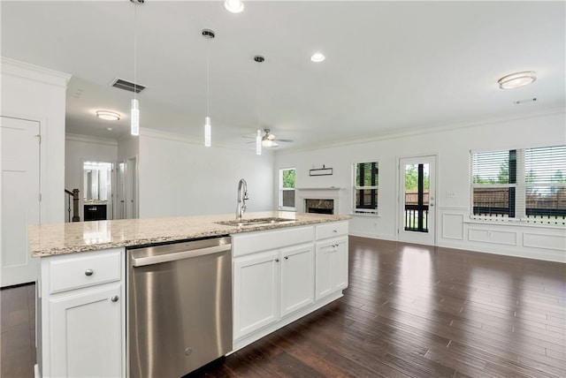 4171 Towncastle Ln, Buford, GA 30518 - kitchen featuring stainless steel dishwasher, a sink, open floor plan, a ceiling fan, and crown molding