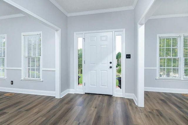 entryway featuring dark hardwood / wood-style floors and crown molding