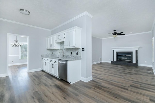 kitchen with dark hardwood / wood-style floors, dishwasher, sink, and white cabinets