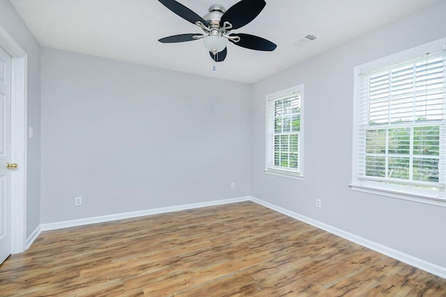 unfurnished room featuring ceiling fan and light hardwood / wood-style floors