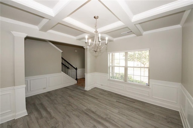 unfurnished dining area featuring beam ceiling, dark hardwood / wood-style flooring, and coffered ceiling