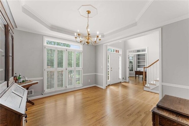 2026 Cresthaven Walk, Woodstock, GA 30189 - living room featuring high vaulted ceiling, ceiling fan, light wood-type flooring, baseboards, and a chandelier