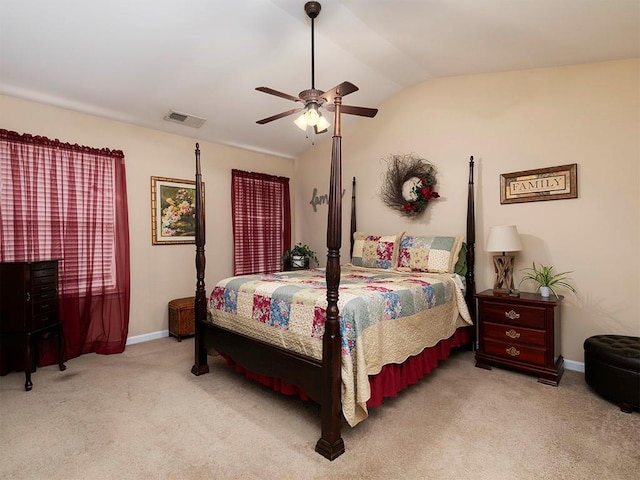 bedroom featuring ceiling fan, light colored carpet, and lofted ceiling