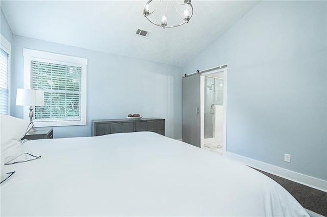 787 Mckendree Lake Way, Lawrenceville, GA 30043 - bedroom featuring lofted ceiling, a chandelier, wood finished floors, and ensuite bathroom