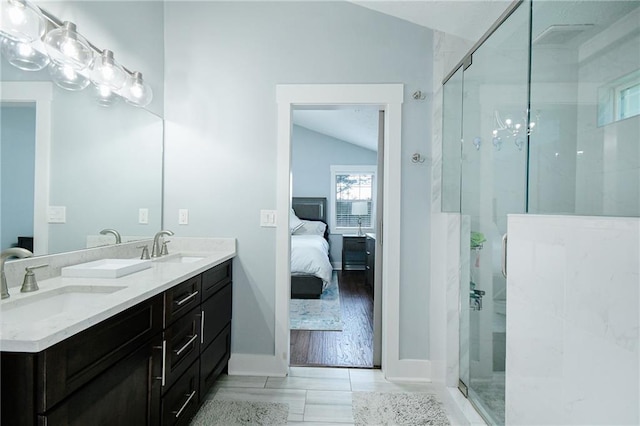 787 Mckendree Lake Way, Lawrenceville, GA 30043 - ensuite bathroom with vaulted ceiling, a shower stall, and double vanity