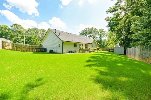 787 Mckendree Lake Way, Lawrenceville, GA 30043 - back of house with a storage shed and a fenced backyard