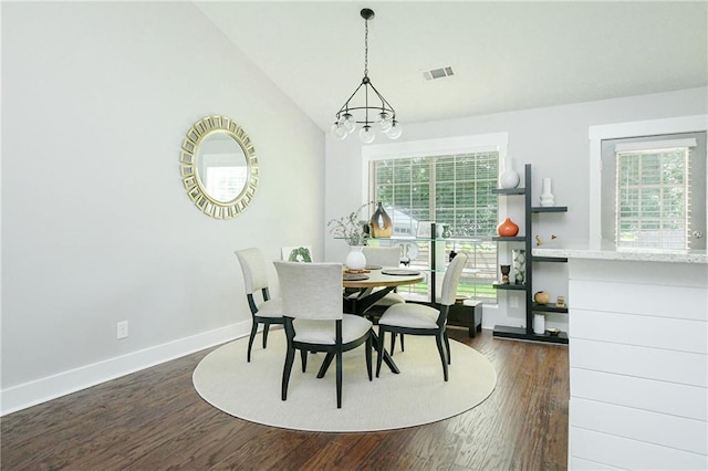 787 Mckendree Lake Way, Lawrenceville, GA 30043 - dining room featuring dark wood-style flooring, vaulted ceiling, and a chandelier