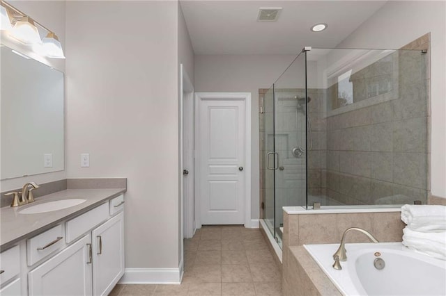 bathroom featuring visible vents, tile patterned floors, vanity, a shower stall, and a bath