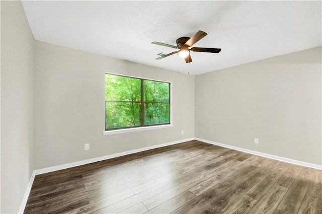 558 Newlin Ct, Lawrenceville, GA 30046 - empty room with ceiling fan and wood finished floors