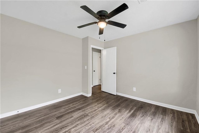 558 Newlin Ct, Lawrenceville, GA 30046 - unfurnished bedroom with wood finished floors and a ceiling fan