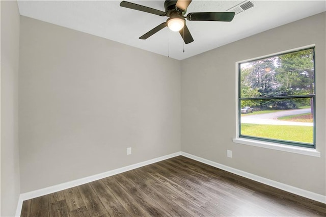 558 Newlin Ct, Lawrenceville, GA 30046 - unfurnished room with dark wood finished floors and ceiling fan