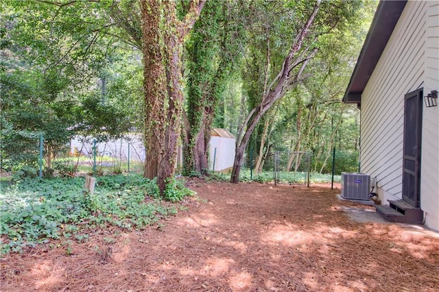 558 Newlin Ct, Lawrenceville, GA 30046 - view of yard featuring a storage unit