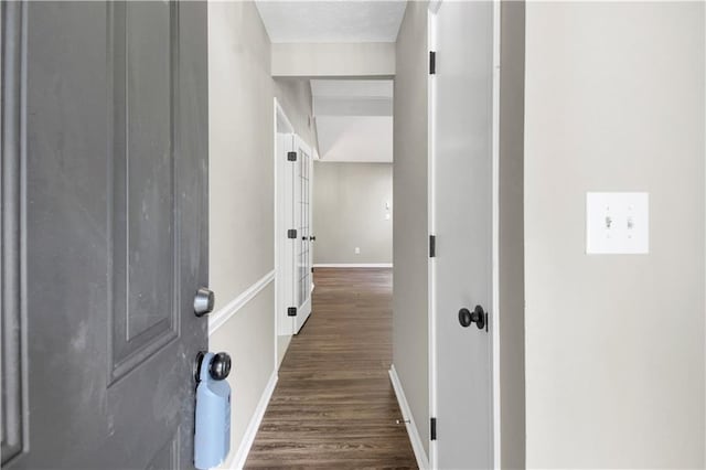 558 Newlin Ct, Lawrenceville, GA 30046 - corridor with dark wood-style flooring and baseboards