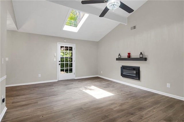 558 Newlin Ct, Lawrenceville, GA 30046 - unfurnished living room with a ceiling fan, a skylight, and wood finished floors