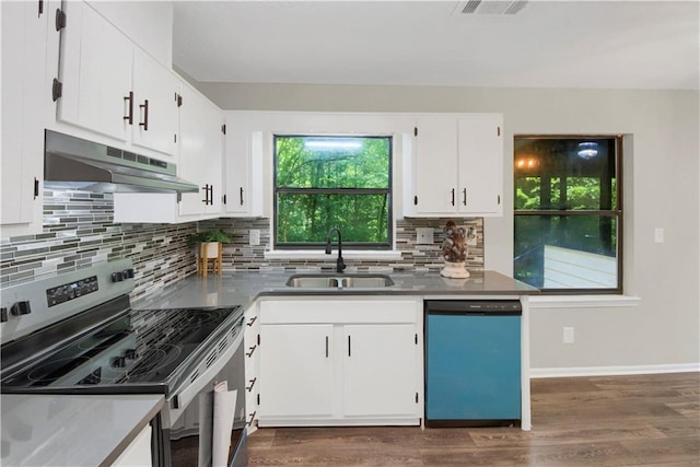558 Newlin Ct, Lawrenceville, GA 30046 - kitchen with stainless steel electric stove, dishwasher, under cabinet range hood, white cabinets, and tasteful backsplash