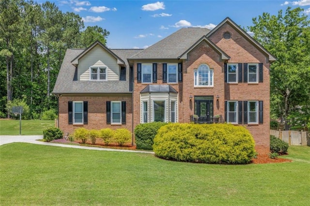 65 Millennial Ct, Lawrenceville, GA 30045 - colonial inspired home featuring brick siding