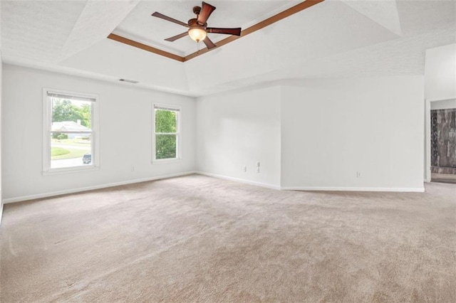 65 Millennial Ct, Lawrenceville, GA 30045 - unfurnished room with carpet flooring, ceiling fan, baseboards, and a raised ceiling