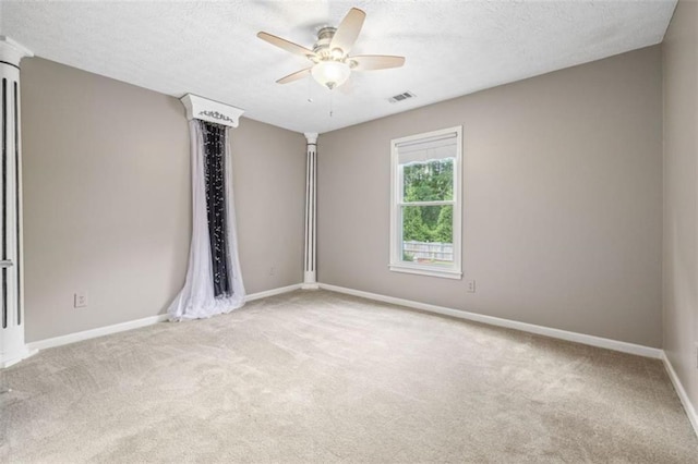 65 Millennial Ct, Lawrenceville, GA 30045 - empty room with ceiling fan, carpet flooring, baseboards, and a textured ceiling