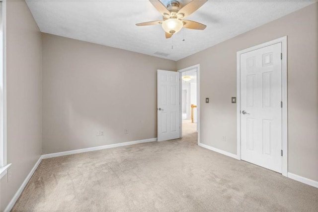 65 Millennial Ct, Lawrenceville, GA 30045 - unfurnished bedroom with carpet, baseboards, and ceiling fan