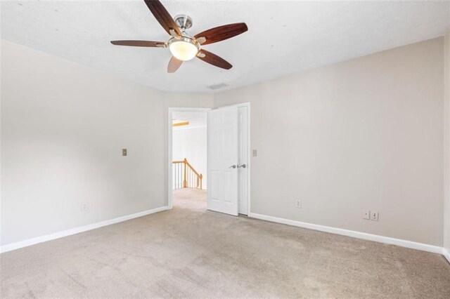 65 Millennial Ct, Lawrenceville, GA 30045 - unfurnished room with carpet flooring, baseboards, and ceiling fan