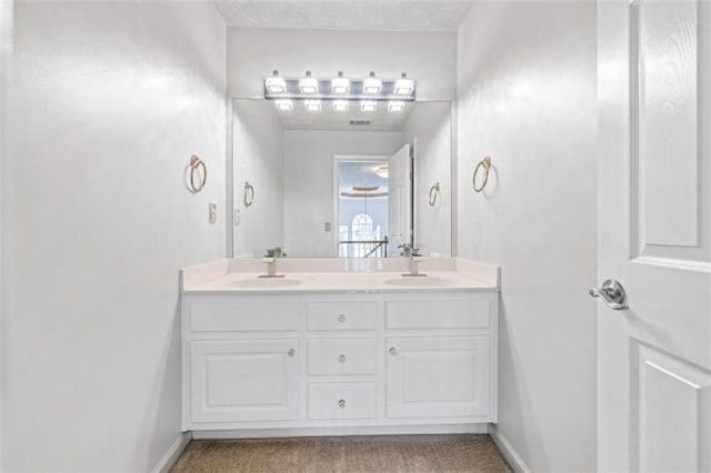65 Millennial Ct, Lawrenceville, GA 30045 - full bathroom with double vanity and baseboards