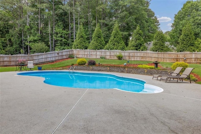 65 Millennial Ct, Lawrenceville, GA 30045 - view of pool with a patio and a fenced backyard