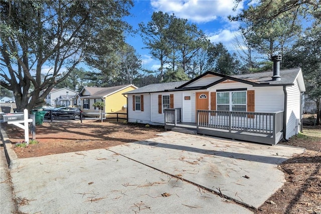 view of front of home with a deck