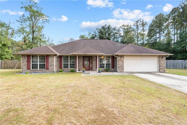 single story home featuring a front yard and a garage