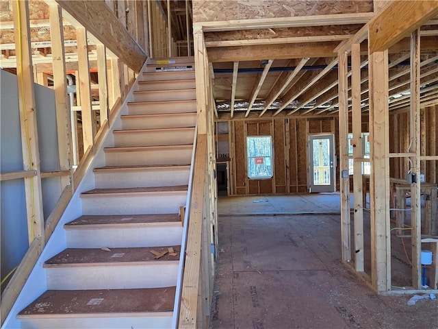 miscellaneous room featuring stairway