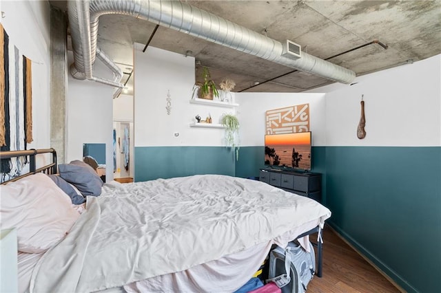 bedroom featuring hardwood / wood-style flooring