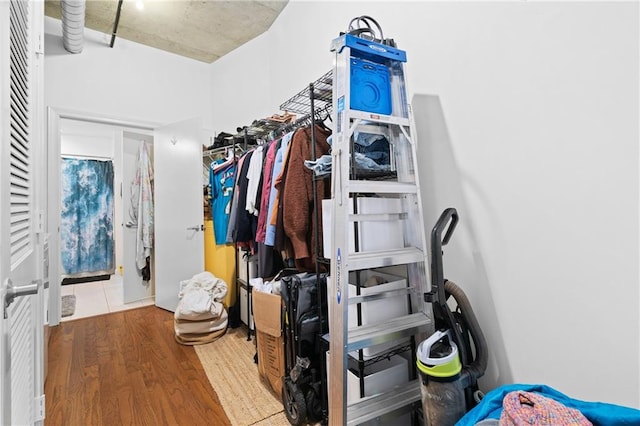 walk in closet featuring wood-type flooring