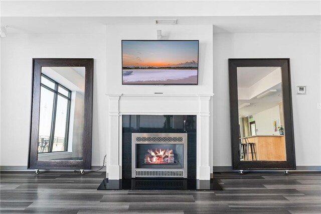 interior details with hardwood / wood-style flooring