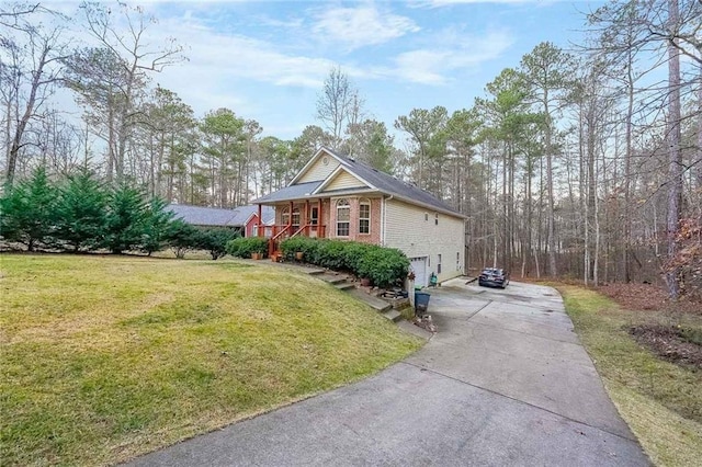 view of home's exterior featuring a garage and a lawn