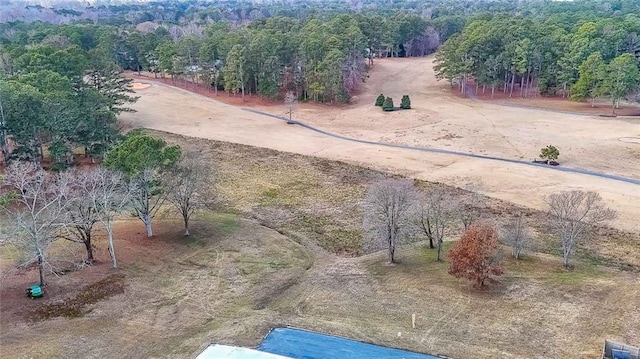 birds eye view of property with a rural view