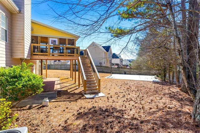 view of playground with a patio