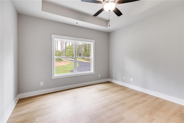 laundry room featuring hookup for a washing machine and light hardwood / wood-style flooring