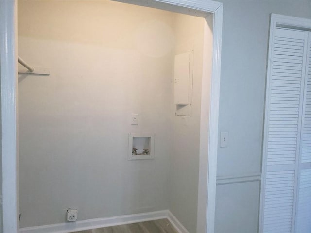 laundry room with washer hookup, hookup for an electric dryer, wood finished floors, laundry area, and baseboards