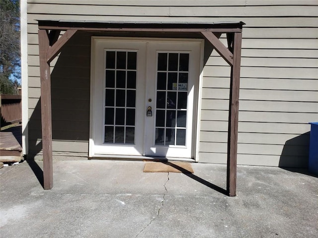 property entrance with french doors and a patio area