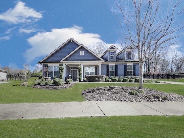 view of front of home with a front lawn