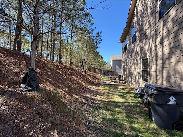 view of yard featuring a patio and fence